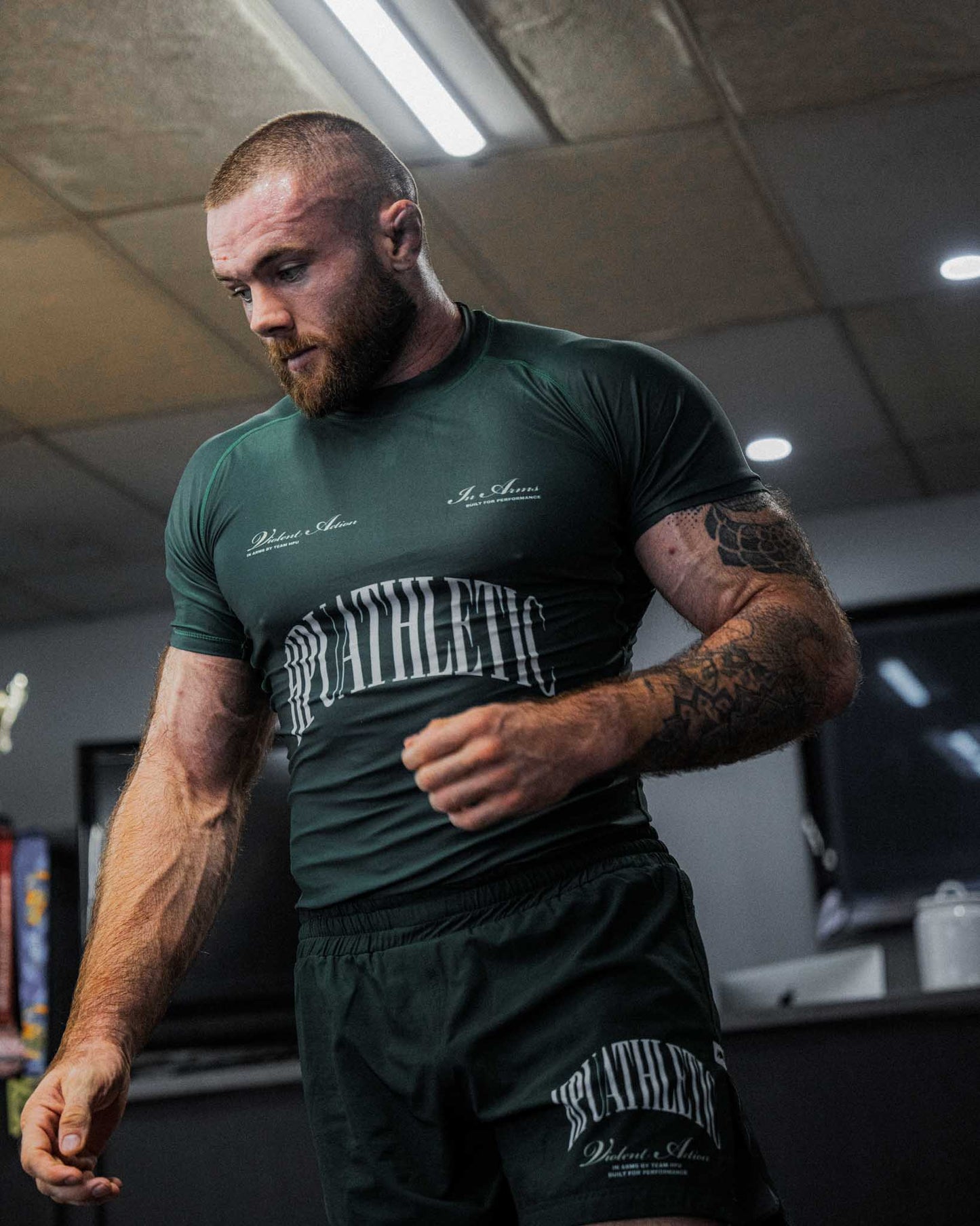 IN ARMS PRO SHORT RACING GRÜN